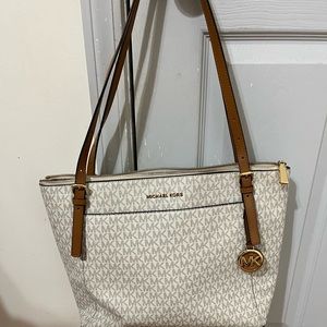 Michael Kors, used a handful of times. Great condition!